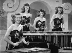 publicdomaindiva:  Members of the swing band Reg Kehoe and his Marimba Queens, c. 1940s. 