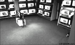 gifsboom:  thief steals  TV.  I was so confused because I didn&rsquo;t read the caption first.