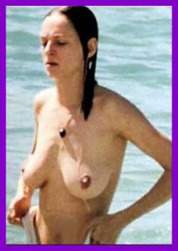 nude-celebz:  Uma Thurman topless at the beach