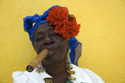 openupnsay-ra:  stage9:  barringtonsmiles:  cubanas/santeras with their cigars looking like the queens they are.   so this is my grandma omg  That’s some bawse shot… 