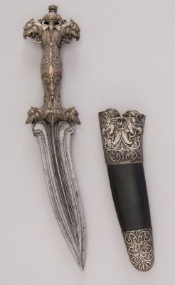 art-of-swords:  Dagger with Sheath Dated: circa 1700 Culture: Sri Lankan Medium: steel, silver, shark skin Measurements: H. with sheath 12 5/8 in. (32.1 cm); H. without sheath 12 ¼ in. (31.1 cm); H. of blade 7 in. (17.8 cm); W. 2 5/8 in. (6.7 cm); Wt.