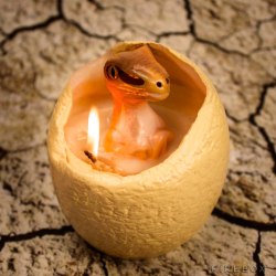 archiemcphee:  Modern science hasn’t advanced enough yet to make the technology of Jurassic World a reality, but these Hatching Dinosaur Egg Candles might help tide us over while researchers continue messing with mosquitos preserved in amber. Each candle