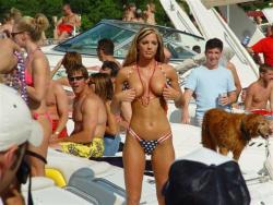 naked-party-girls:  This looks like the start of something good!  Hot bleach blonde with her bikini half off playing with her nipples in the middle of a boat party.  Nice!  More Naked Party Girls  Want to learn to score with girls like this?  CLICK