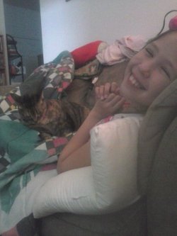 My little sister, happy to cuddle with our old grumpy ass of a cat lol