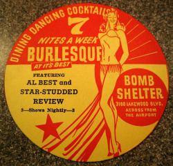 Beautiful graphic design is featured on a vintage 50&rsquo;s-era coaster from ‘The BOMB SHELTER’.. This nightclub was operated by Hank Bickles and Jack Groat; and was located in Long Beach, California..