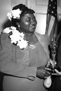 vintagegal:  On February 29th, 1940, Hattie McDaniel earned the Academy Award for best supporting actress for her role as Mammy in Gone With the Wind, becoming the first African American to win an Oscar.Yet on the night McDaniel became the first black