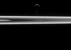 itsfullofstars:  SPACE RINGS Saturn’s icy moon Enceladus and a small stretch of Saturn’s rings, as seen by the Cassini spacecraft on July 29, 2015. 