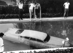 whosthegloomiesofthemall:  A submerged car is ‘parked’ in a swimming pool by its drunken owner in Beverly Hills, California, May 4th, 1961. 