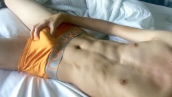 twinktommy:I love my orange calvins! They fit perfectly and tight! Thanks daddy 😚So what would you do if you walked in and saw me in my bed like that?
