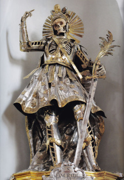 blackpaint20:  The Bones of St Pancratius are found at the Church of St Niklaus in Wil, Switzerland. He was originally robed in clothes by nuns in the late 1600s but in 1777 – the centenary of his bones arriving in Wil – he was dressed in this magnificent