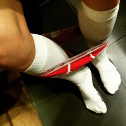 Men in rugby and footy socks
