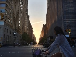 thezartorialist:  was riding home from work on 59th street when i heard a girl yell  “hey!” behind me. thought i accidentally cut someone off in the street. turned out it was my wife who was also biking home from her office. nyc is such a tiny place