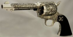 purposetomelody:One day, I’ll own an engraved colt as breathtaking as this one. It was engraved by Leonard Francolini. You can find more of his work here. Every piece is absolutely stunning.