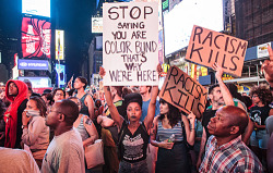 racismschool:  searchingforknowledge:  kingerock288:  gurl:   Why I’m Still Upset About The Trayvon Martin Verdict, And You Should Be Too  © Kevin C. Downs/ News Pictures/WENN.com  That middle sign  STOP saying you are colorblind. Thats why we’re