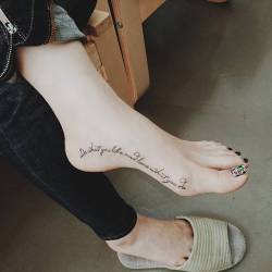 cutelittletattoos:  “Do what you like and love what you do” tattoo on the inner foot. Tattoo artist: Doy
