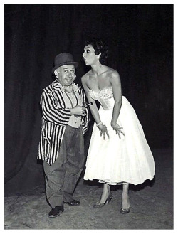 Novita   (aka. Rosie Mitchell)   Posing with popular Burlesk comic Little Jack Little, for a candid photo taken backstage at the ‘FOLLIES Theatre’ in Los Angeles.. Image courtesy of Novita, The Pixie of Burlesque..  