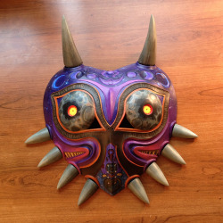 melissakking:  I painted this Majora’s mask for a kickstarter that’s going to be happening soon! It’s inspired by the moon and clock tower imagery from the game. I’ll post more info about the kickstarter when it happens!    Toxic vitamin