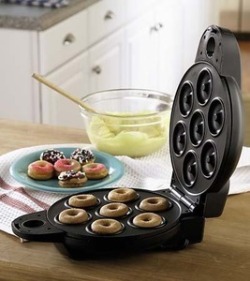 saber-toothed-kittens:  http://actuallyforsale.com/go/mini-donut-maker  Mini Donut Maker7 awesome donuts you can make at a moment’s notice.  