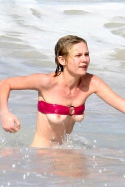 Kirsten Dunst falls out of her bikini top in St. Bartâ€™s, Caribbean (January 2005)