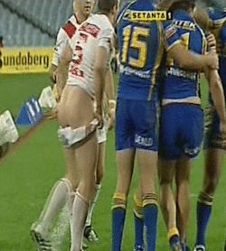 darkmythology: malesportsbooty:  Rugby player has shorts pulled down - camera gets close up of his bare arse.   Could sniff that arse all day 