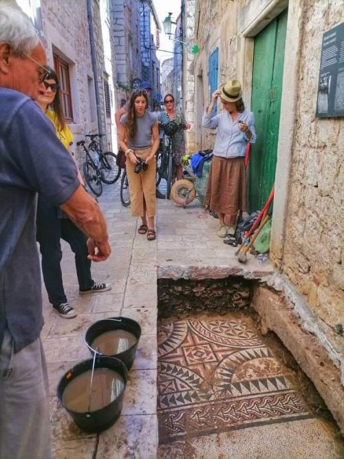 thenewdres-k:  blueiskewl:  Ancient Roman Mosaic Found in CroatiaA Roman mosaic has been revealed under a narrow street in the Old Town of the Adriatic island of Hvar, Croatia. The elaborate geometric mosaic floor dates to the 2nd century A.D. and was