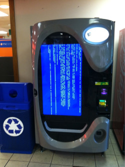 thefutureisneon:  Tampering with any government provided convenience services is a very serious crime. Anyone caught in the act will be dealt with promptly.  WTF does this vending machine even sell anyways? LMFAO!