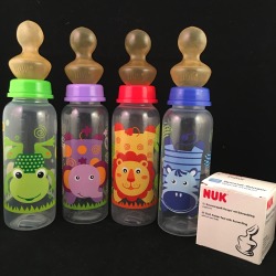 onesiesdownunder:  Baby Bottles with an Adult NUK Teat.Green FrogPurple ElephantRed LionBlue Zebra Adult NUK Teat We offer discreet shipping worldwide.