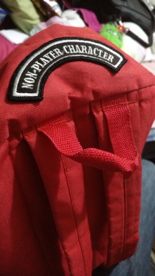 Got some free time, so I sewed up a hole in my red bag, and added my NPC patch! 