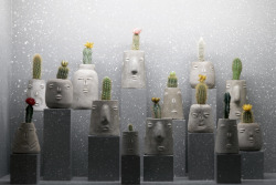 80sdeco:Theo Mercier face vases with cacti on speckled pedestals 