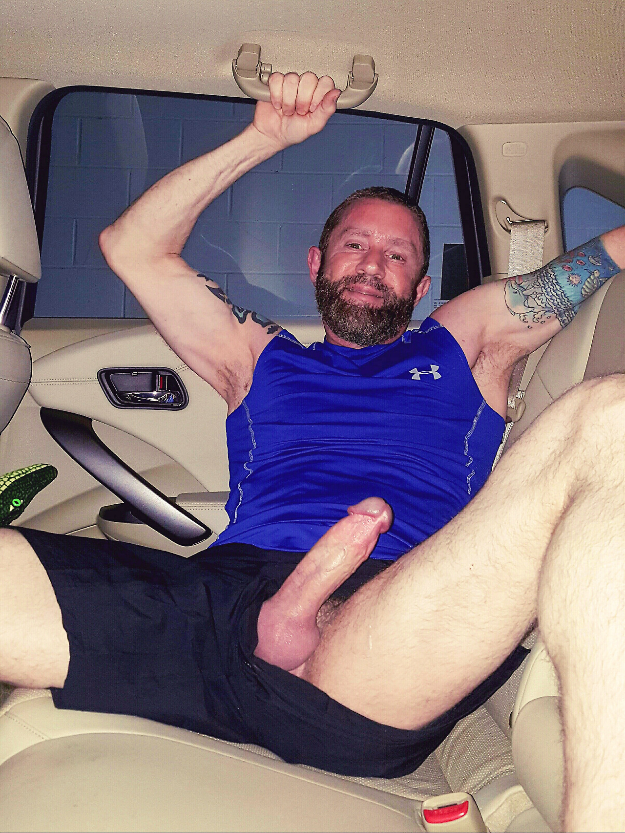 geckoguy62:  Playing around in the back seat of my SUV in the parking lot after the