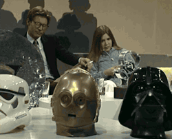 aura218:  universalkeys:  Harrison Ford &amp; Carrie Fisher on French TV, 1977  are we not gonna talk about the headless cyborgs as trophies in the middle of the table 