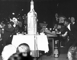 sammydavisjunior:  Sammy Davis, Jr. hits Dean Martin with a pie during a show at the Sands Hotel in Vegas, early 1960s 