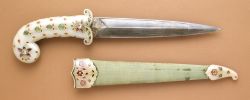 art-of-swords:  Mughal Dagger  Dated: circa 1675-1700 (sheath fittings, circa 1800) Culture: Indian, Mughal Medium: white nephrite jade hilt and sheath fittings inlaid with foiled rubies, emeralds, and diamonds set in gold; steel blade; velvet covered