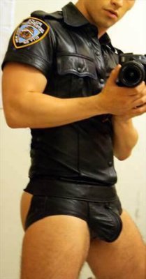 southerncrotch:  When I take over the world, this will be the official uniform (and body type) for all policemen, everywhere. 