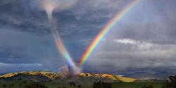 fanofphan:  wild-guy:  classy-and-glamorous-babe:  &ldquo;A friend took this pic in Arizona USA. The meteorologists don’t have a name for it.  Seems to be high energy to be in a Rainbow and a tornado! ”  Gaynado  it looks like a rainbows vagina 