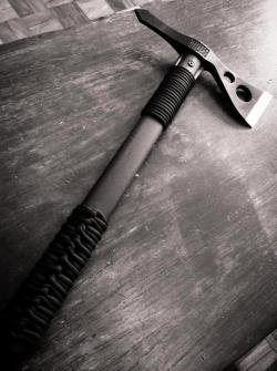 gunsknivesgear:  ponifythings:  cragthor29:  ponifythings:  gunsknivesgear:  SOG Tomahawk. Modded with paracord wraps.  I like the grip near the axehead, which is useful for close-quarter work.  I would very much like to throw this. It doesn’t look