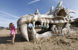 Fanciful relic (a 39-foot dragon skull sculpture was erected on Charmouth Beach, Jurassic Coast, Dorset UK in honour of Season 3 of Game of Thrones)