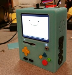 nerdsandgamersftw:A Working BMO Super Nintendo Emulator3D print designer Mike Barretta built this amazing BMO emulator using an assortment of 3D printed pieces and Super Nintendo buttons, as well as a mixture of electronic equipment. To see this emulator