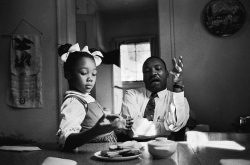 hittings:  This photograph was taken as King tried to explain to his daughter Yolanda why she could not go to Funtown, a whites-only amusement park in Atlanta. King claims to have been tongue-tied when speaking to her. “One of the most painful experiences