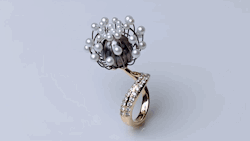 treasures-and-beauty: Blossom Ring. Designed by Chi Huynh, Galatea Jewelry. Made from nitinol, an alloy of nickel and titanium that retains memory of its shape and moves back into it when warmed.   