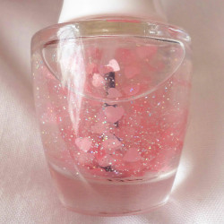 xpinkrosehimex:   How cute is this nail polish, Glitter with pink hearts ❤ 