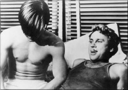 Joe Dallesandro and Paul Morrissey in the Warhol film, Flesh.