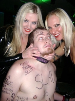 taraindiana:  girlsrule-subsdrool: This looks like a fun party! Bodywriting and CFNM! I also really enjoy the multitude of emotions in his expression. Yes, these are My friends, Mistresses Lexi Sindel and Coral Corrupt, two of the most lethal blondes