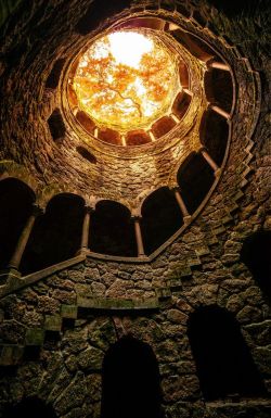 Climb into the light (stairway to a tower turret in Quinta de Regaleira, a World Heritage Site palace in Sintra, Portugal)