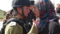 the-uncensored-she:androphilia:  “LOOK INTO MY EYES AND GET OUT OF MY LAND!&ldquo; (via Johayna جهينة خالدية)  A Palestinian woman facing off against a piece-of-shit IDF soldier. Western feminists need to STOP heralding female IDF soldiers