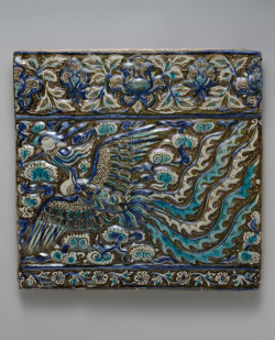 design-is-fine: Tile from a frieze with image of Phoenix, late 13th century. Stonepaste, Iran. Via metmuseum The image of a soaring phoenix with crested head and elaborate trailing plumage exemplifies the adaptation of Chinese imagery by Persian artists.