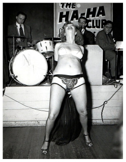   Winnie Garrett laughs it up at the famed ‘HA HA Club’; located on &ldquo;Strip Alley&rdquo; (52nd Street) in New York City..  