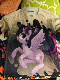 hobbsmeerkat:  fillydelphia:  sofasandquills:  This came in the mail today! I don’t usually get any of my own shirts or pony shirts in general, but I had to get one of these. I love how it came out, and it’s crazy seeing my art completely covering