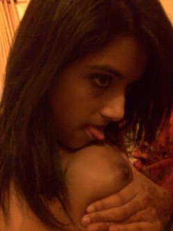 sexybddeshigirls:  Desi Girl Sucking her Own Boobs Pictures