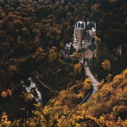 melodyandviolence:     Burg Eltz  by  Hannes Becker       (Eltz Castle is a medieval castle nestled in the hills above the Moselle River between Koblenz and Trier,Germany. It is still owned by a branch of the same family (the Eltz family) that lived